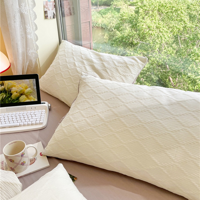 91家纺网 家纺一手货源 找家纺 琪格格纺织 2026新款纯棉色织肌理纹提花华夫格纯棉轻奢简约款四件套 泡泡纱米白奶咖