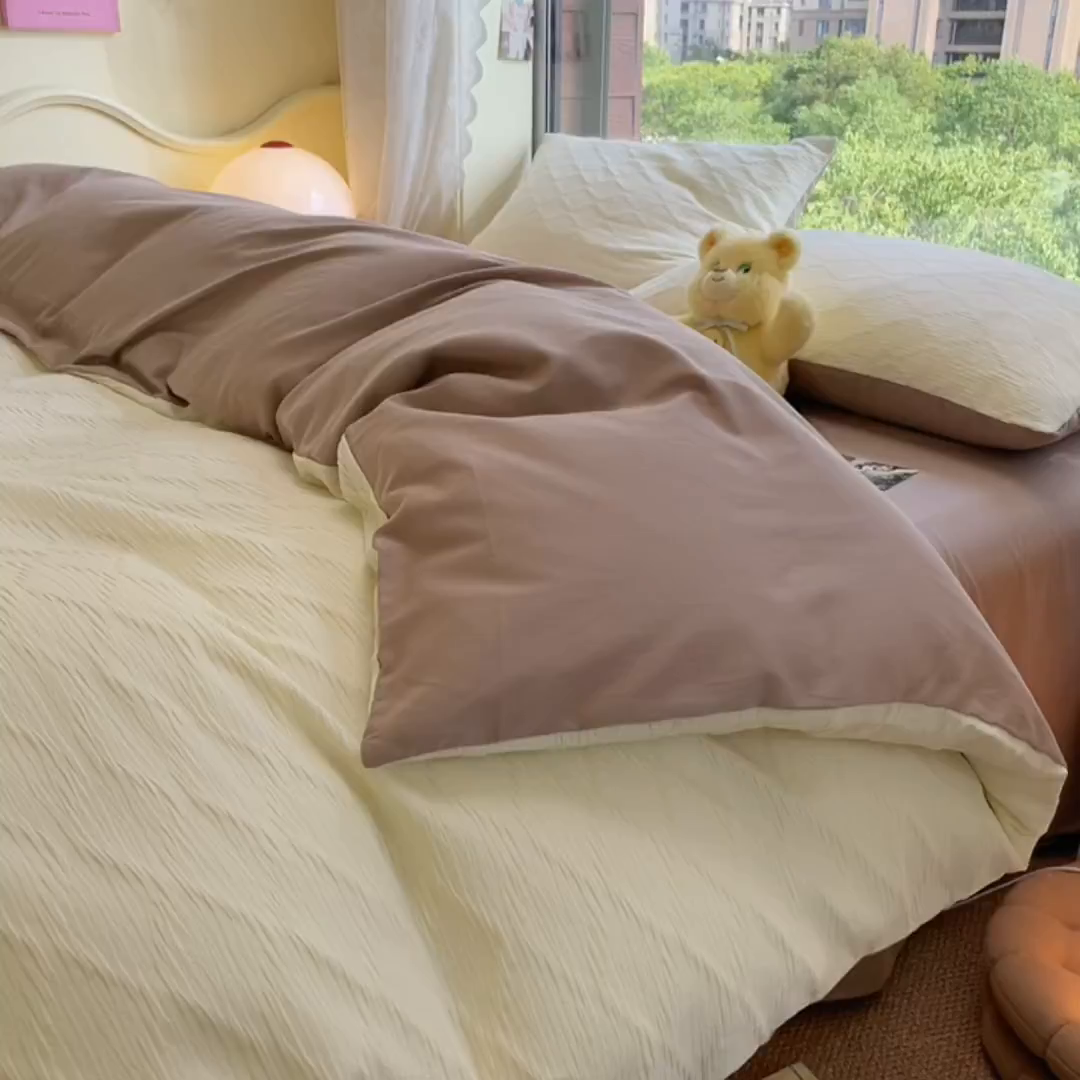 91家纺网 家纺一手货源 找家纺 琪格格纺织 2026新款纯棉色织肌理纹提花华夫格纯棉轻奢简约款四件套 泡泡纱米白奶咖