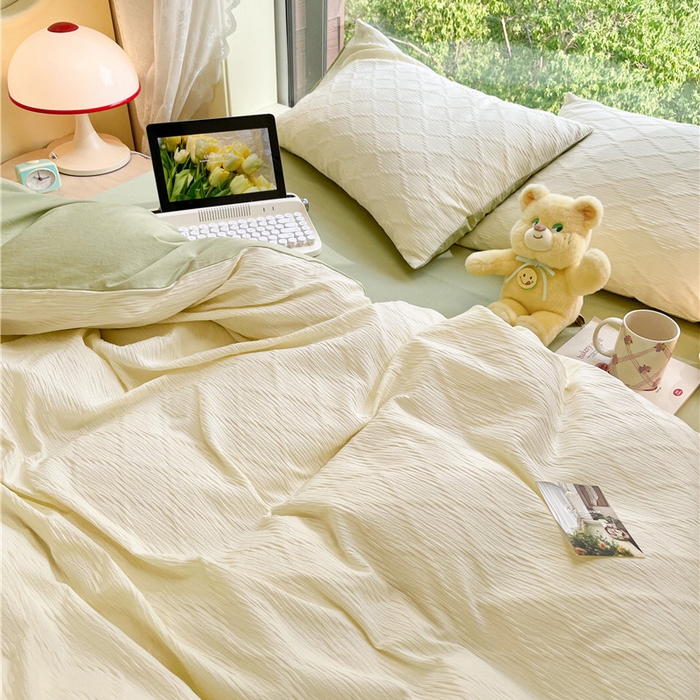 91家纺网 家纺一手货源 找家纺 琪格格纺织 2026新款纯棉色织肌理纹提花华夫格纯棉轻奢简约款四件套 泡泡纱米白奶绿