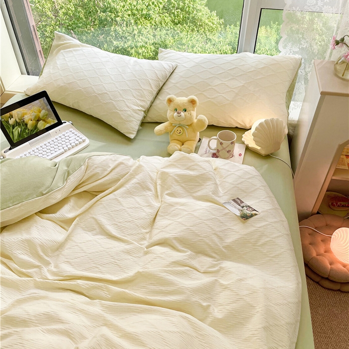 91家纺网 家纺一手货源 找家纺 琪格格纺织 2026新款纯棉色织肌理纹提花华夫格纯棉轻奢简约款四件套 泡泡纱米白奶绿