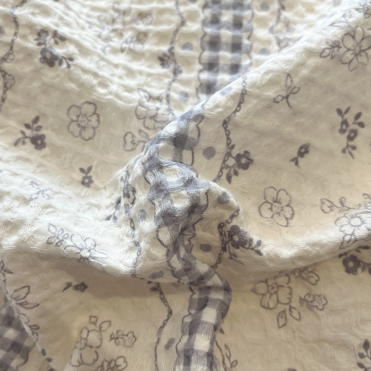 91家纺网 家纺一手货源 找家纺 莱茵家居 2026新款A类全棉华夫格印花贝壳边套件-华夫系列 华夫-丁香