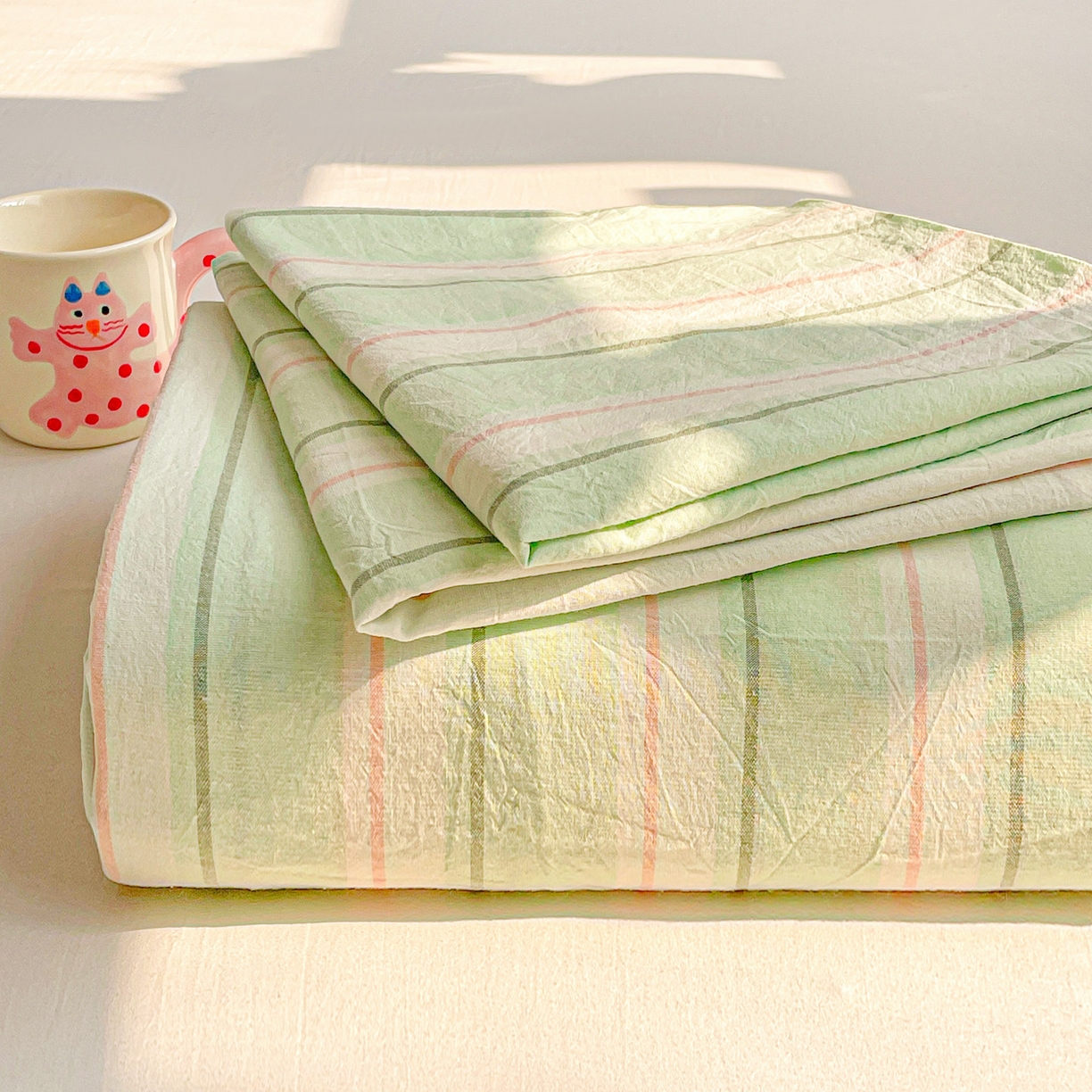 91家纺网 家纺一手货源 找家纺 柠萌家居 2026新款全棉A类色织水洗棉母婴级简约格子三件套床单 倾城-绿