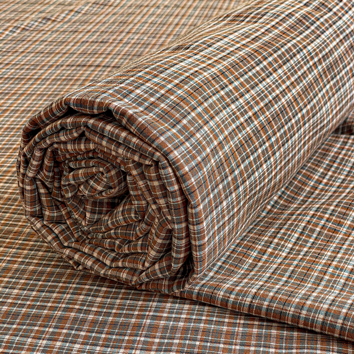 91家纺网 家纺一手货源 找家纺 柠萌家居 2026新款全棉A类色织水洗棉母婴级简约格子三件套床单 苏格兰-咖