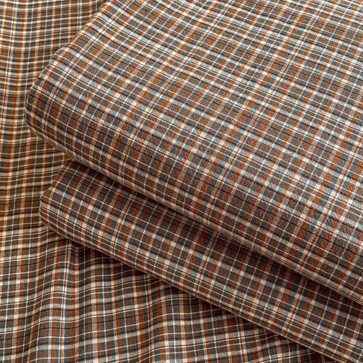 91家纺网 家纺一手货源 找家纺 柠萌家居 2026新款全棉A类色织水洗棉母婴级简约格子三件套床单 苏格兰-咖