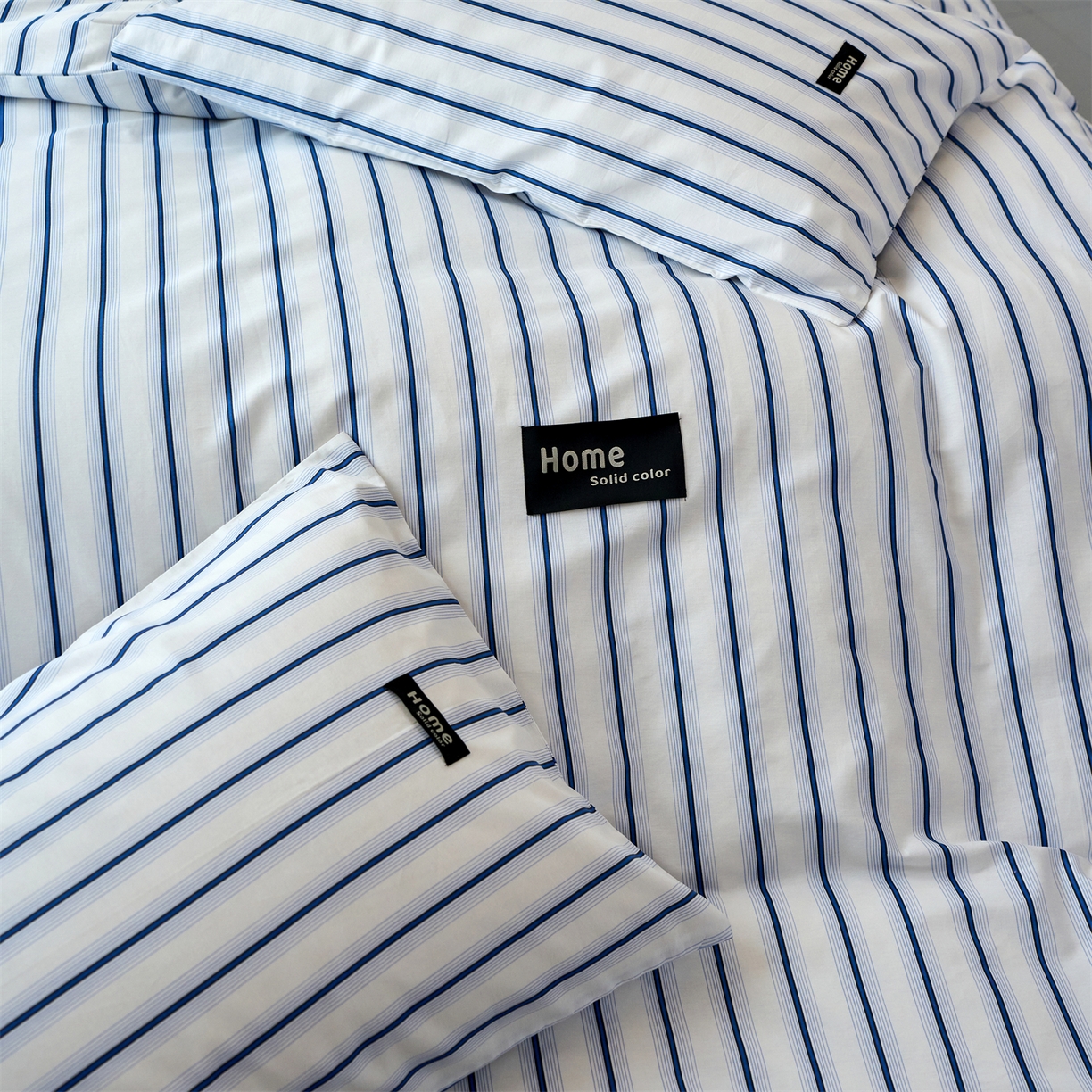 91家纺网 家纺一手货源 找家纺 兰紫橙家纺 2026新款简约风全棉条纹四件套 白芷