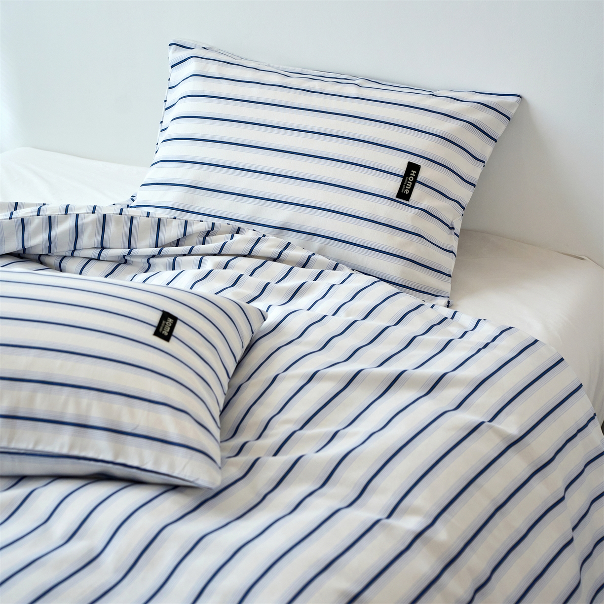 91家纺网 家纺一手货源 找家纺 兰紫橙家纺 2026新款简约风全棉条纹四件套 白芷