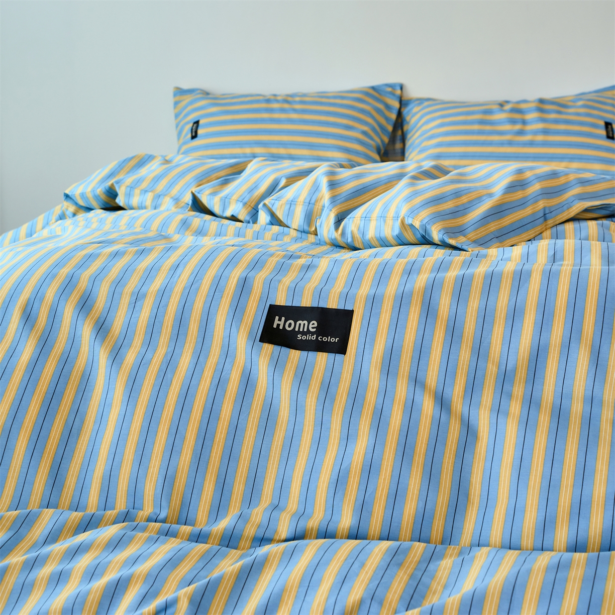 91家纺网 家纺一手货源 找家纺 兰紫橙家纺 2026新款简约风全棉条纹四件套 初夏