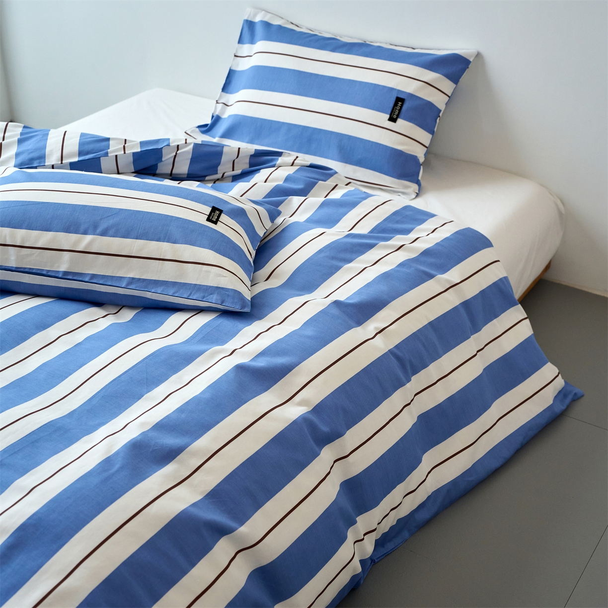 91家纺网 家纺一手货源 找家纺 兰紫橙家纺 2026新款简约风全棉条纹四件套 琥珀