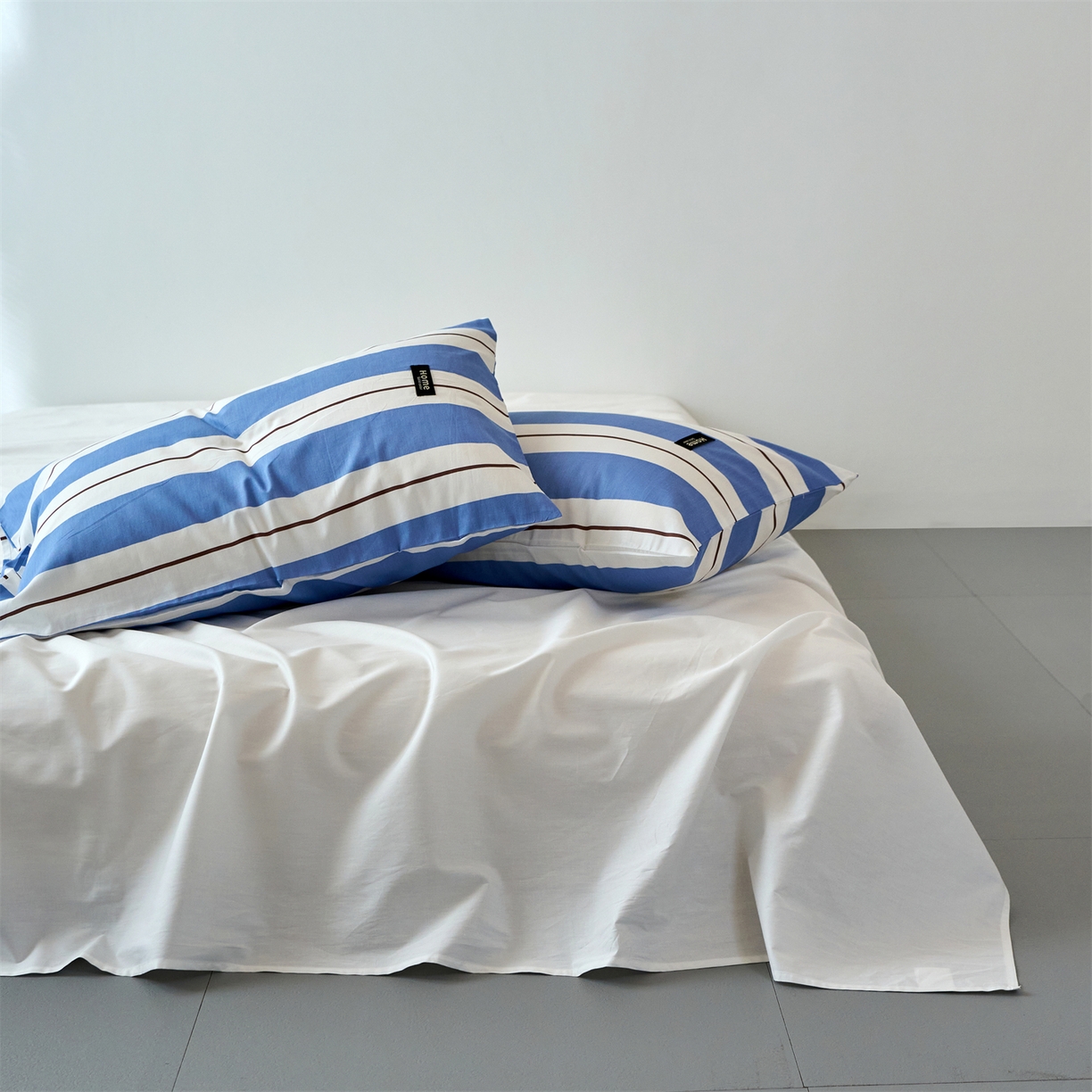 91家纺网 家纺一手货源 找家纺 兰紫橙家纺 2026新款简约风全棉条纹四件套 琥珀