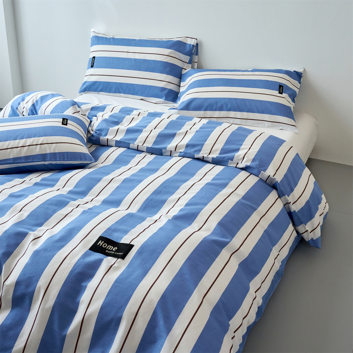 91家纺网 家纺一手货源 找家纺 兰紫橙家纺 2026新款简约风全棉条纹四件套 琥珀