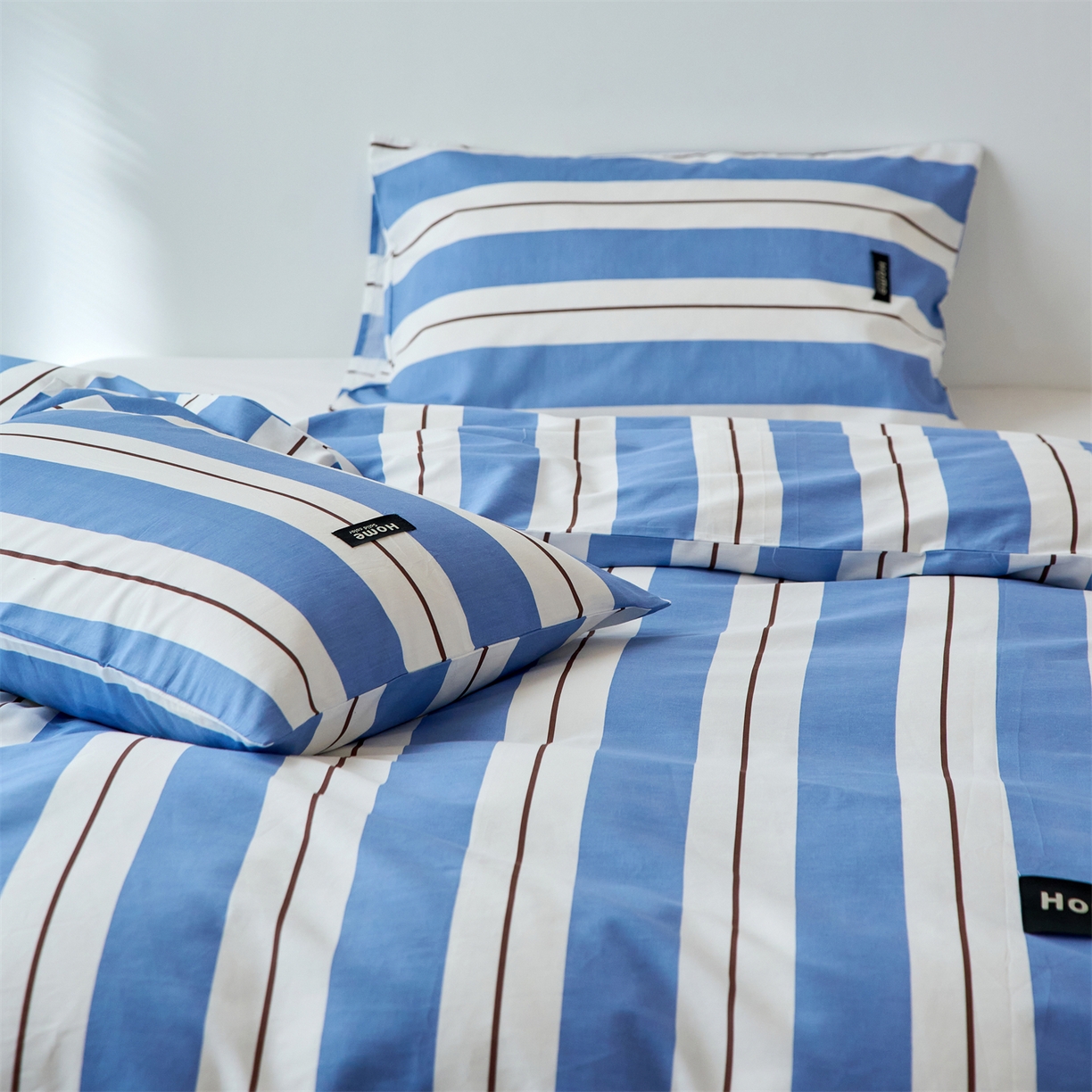 91家纺网 家纺一手货源 找家纺 兰紫橙家纺 2026新款简约风全棉条纹四件套 琥珀