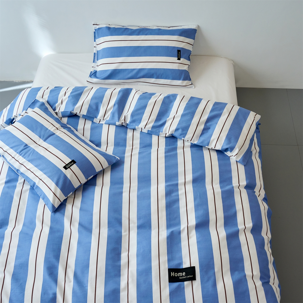 91家纺网 家纺一手货源 找家纺 兰紫橙家纺 2026新款简约风全棉条纹四件套 琥珀