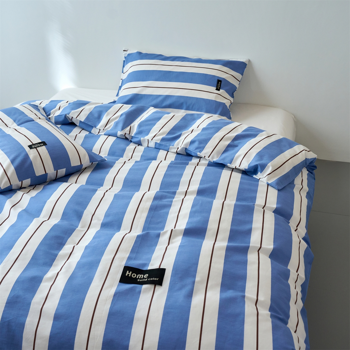 91家纺网 家纺一手货源 找家纺 兰紫橙家纺 2026新款简约风全棉条纹四件套 琥珀