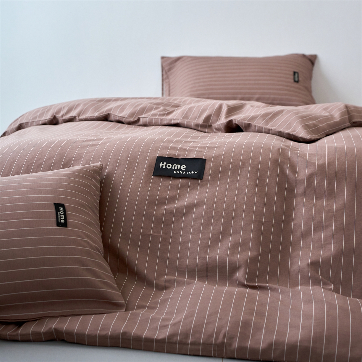 91家纺网 家纺一手货源 找家纺 兰紫橙家纺 2026新款简约风全棉条纹四件套 怀汐