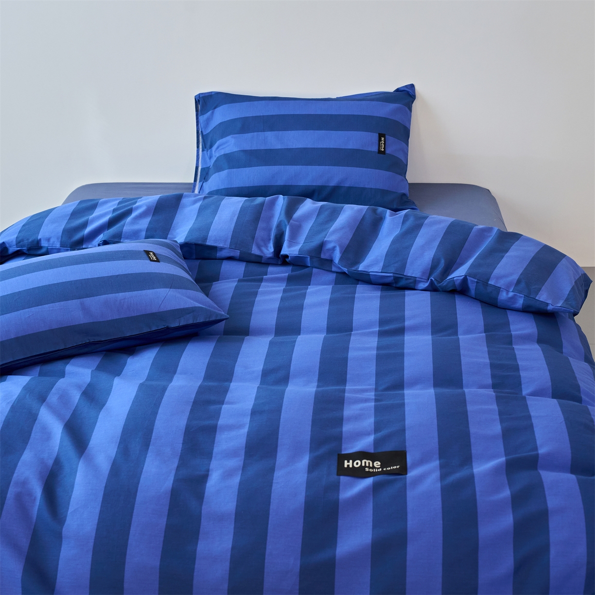 91家纺网 家纺一手货源 找家纺 兰紫橙家纺 2026新款简约风全棉条纹四件套 菘蓝