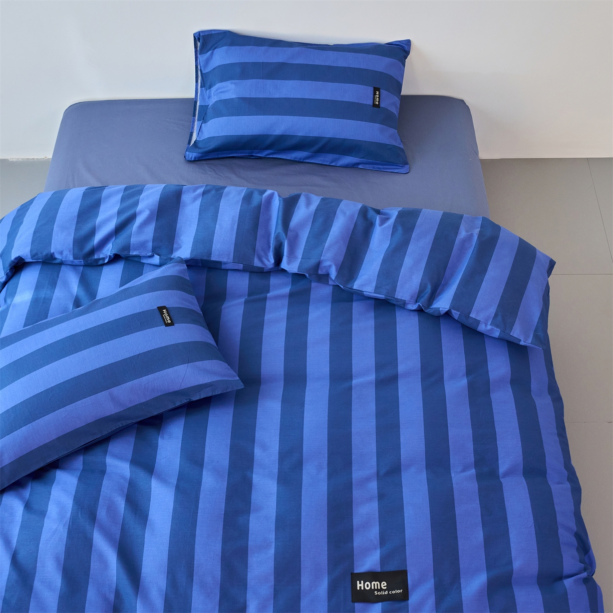 91家纺网 家纺一手货源 找家纺 兰紫橙家纺 2026新款简约风全棉条纹四件套 菘蓝