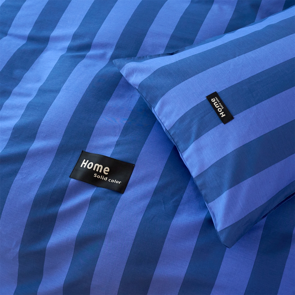 91家纺网 家纺一手货源 找家纺 兰紫橙家纺 2026新款简约风全棉条纹四件套 菘蓝