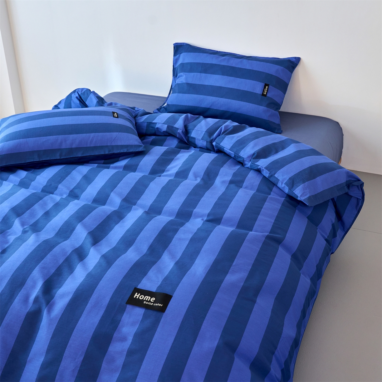 91家纺网 家纺一手货源 找家纺 兰紫橙家纺 2026新款简约风全棉条纹四件套 菘蓝