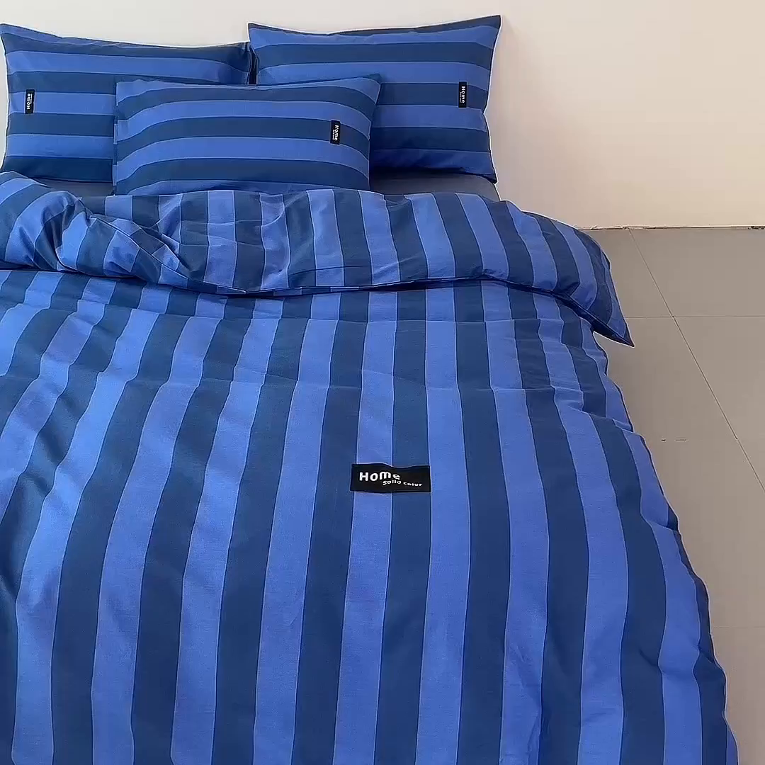 91家纺网 家纺一手货源 找家纺 兰紫橙家纺 2026新款简约风全棉条纹四件套 菘蓝