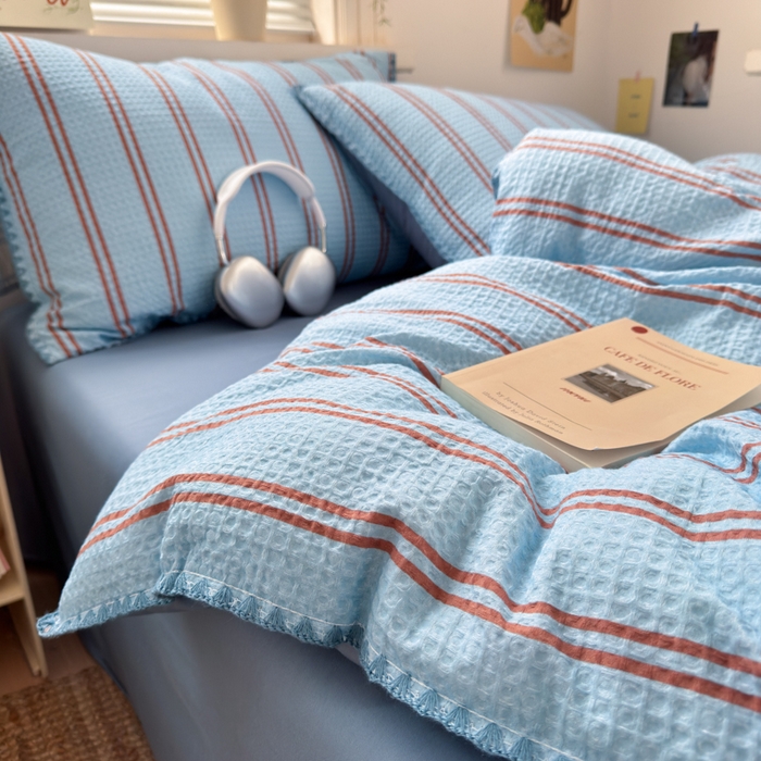 91家纺网 家纺一手货源 找家纺 典曼家纺 2026新款A类全棉华夫格提花贝壳边四件套 风月-兰