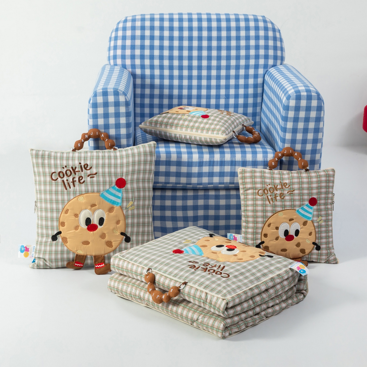 91家纺网 家纺一手货源 找家纺 雷娜家居 2026新款水洗棉手提款曲奇抱枕被 水洗棉饼干香草绿