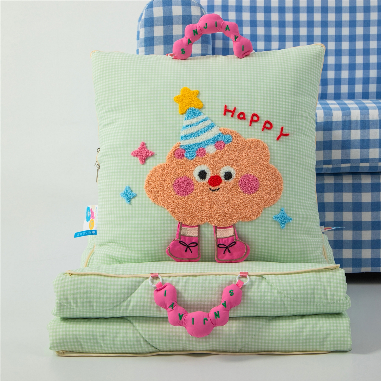 91家纺网 家纺一手货源 找家纺 雷娜家居 2026新款水洗木棉手提款云朵曲奇抱枕被 云朵绿