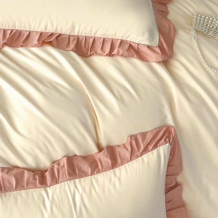 91家纺网 家纺一手货源 找家纺 艾迪尚家纺 2026新款法式韩版荷叶边纯色长绒棉单品枕套系列 奶芙慕粉