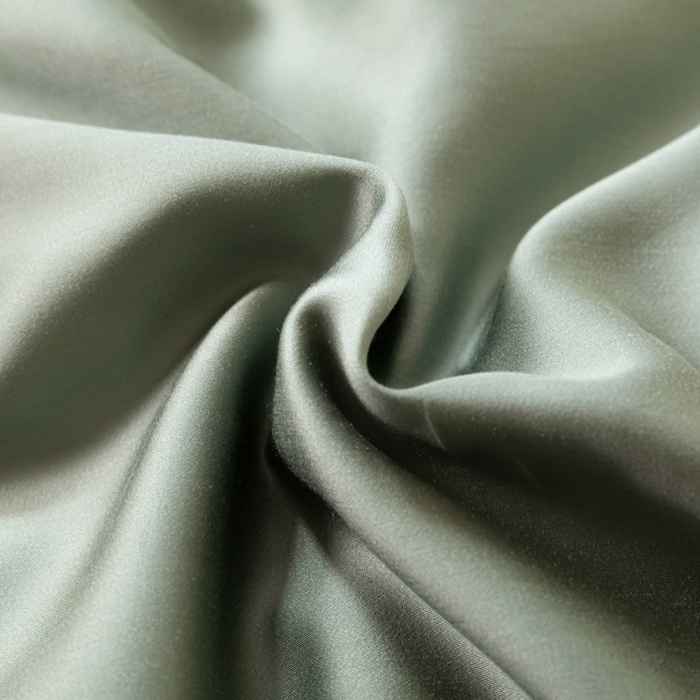 91家纺网 家纺一手货源 找家纺 涵宸家纺 2026新款纯色天丝棉四件套-场景二 赛琳绿+奶茶杏