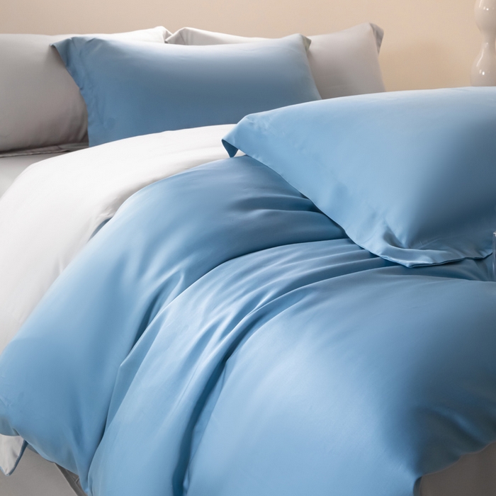 91家纺网 家纺一手货源 找家纺 涵宸家纺 2026新款纯色天丝棉四件套-场景二 星耀兰+时尚灰