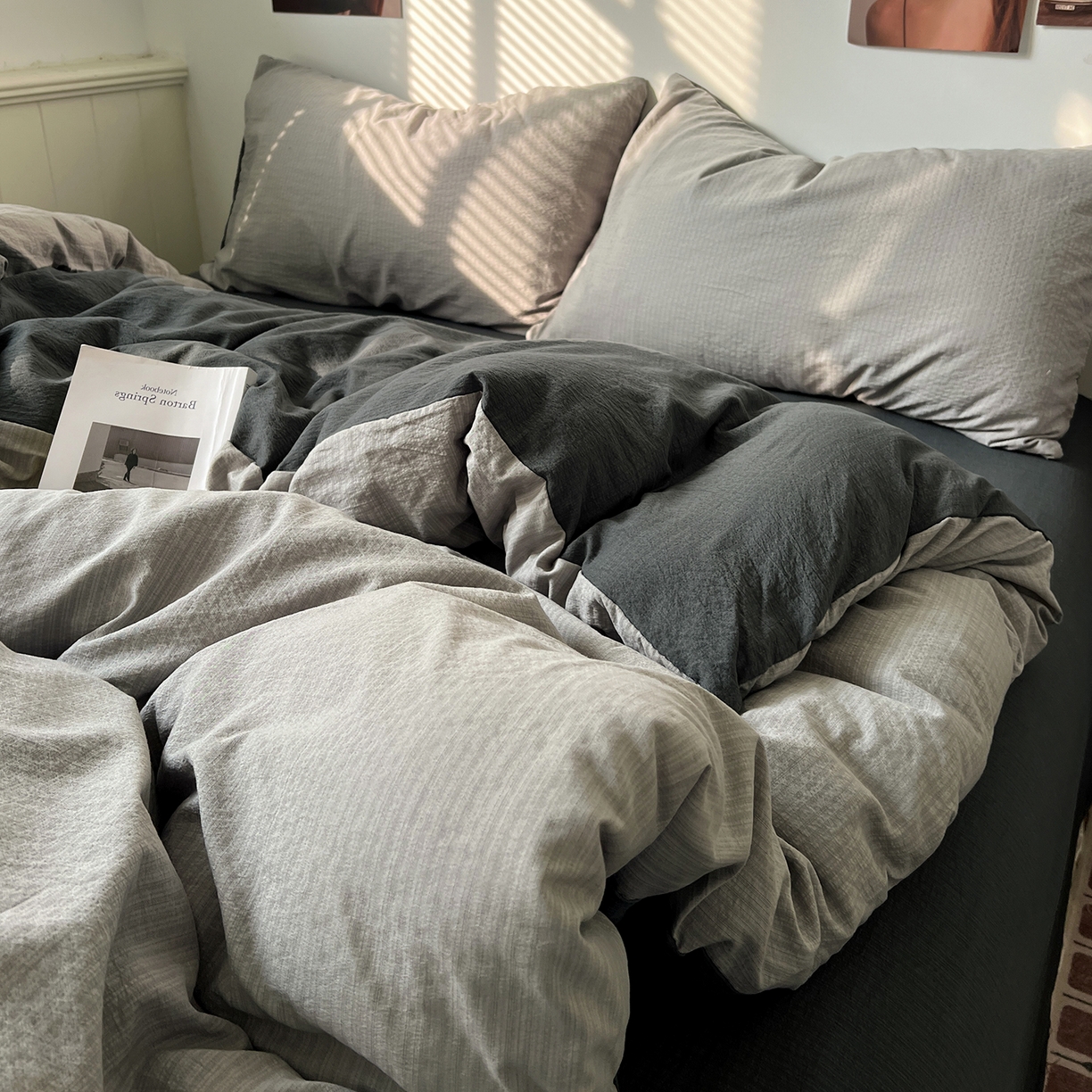 91家纺网 家纺一手货源 找家纺 花伞家居 2026新款简约纯色双拼双层纱高克重水洗棉四件套 松烟灰+石墨灰