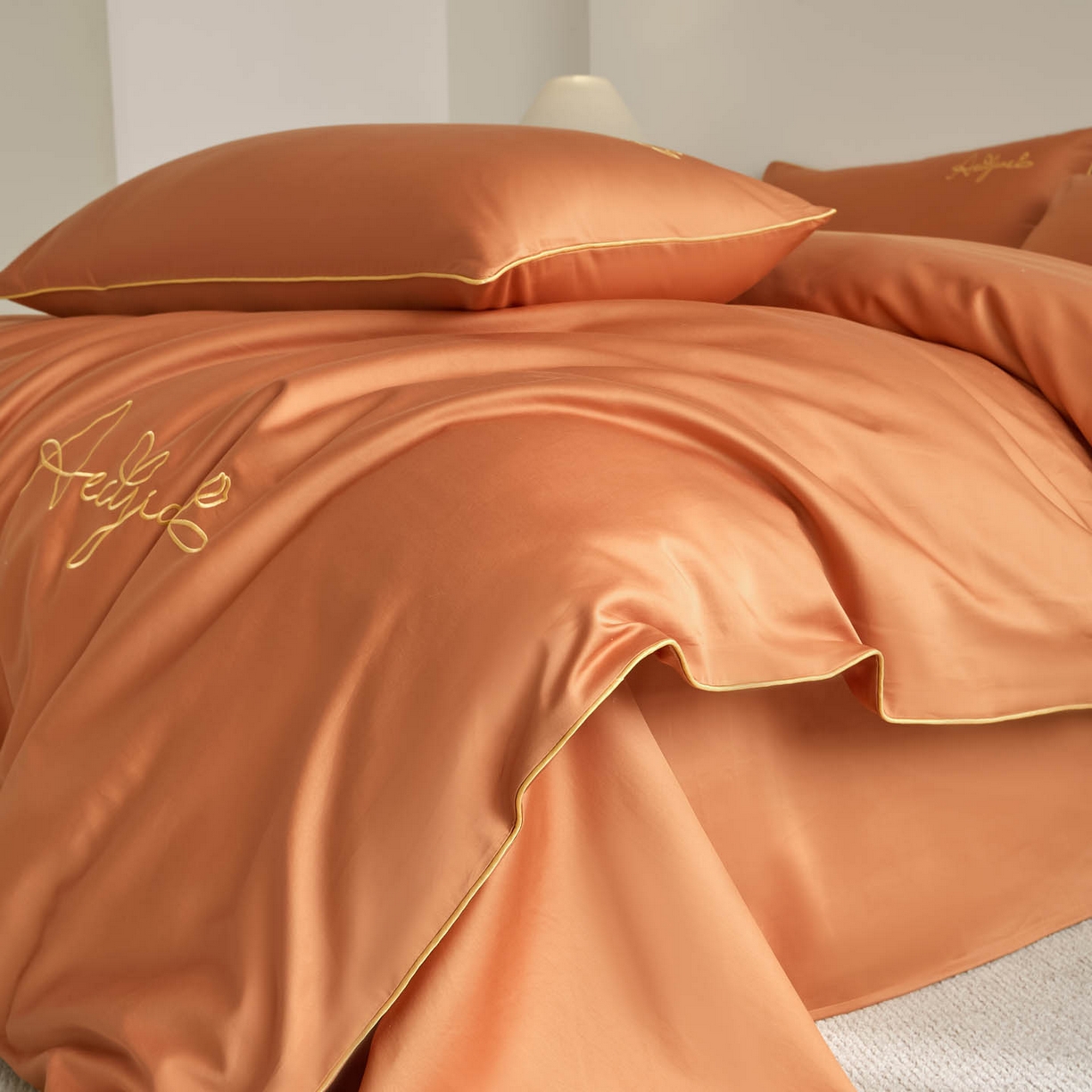 91家纺网 家纺一手货源 找家纺 涵宸家纺 2026新款全棉工艺款简奢刺绣四件套-千叶 千叶-橙