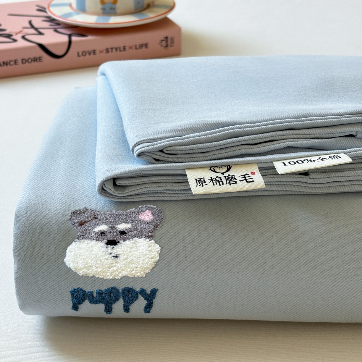 91家纺网 家纺一手货源 找家纺 居眠 2026新款全棉磨毛毛巾绣床单 海盐蓝-狗狗-床单