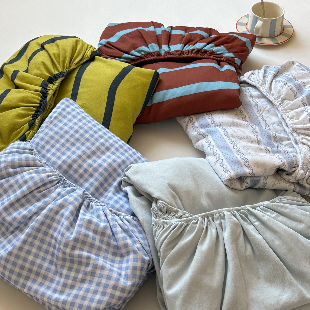 91家纺网 家纺一手货源 找家纺 居眠 2026新款全棉磨毛毛巾绣床笠 叠拍组合