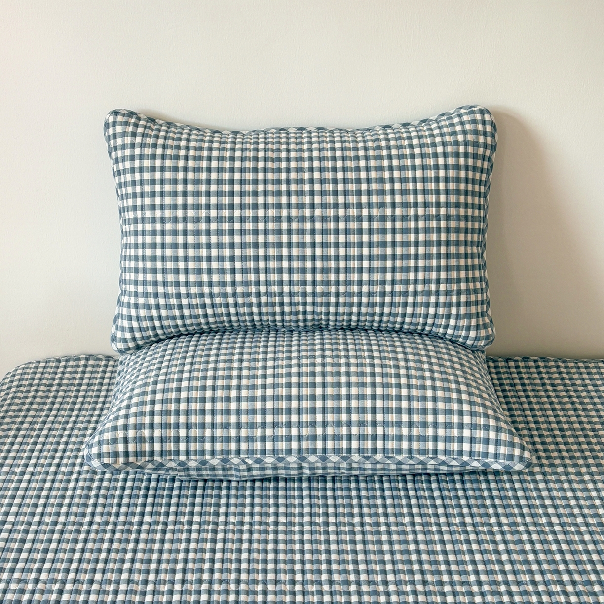 91家纺网 家纺一手货源 找家纺 居眠 2026新款全棉色织水洗棉格子夹棉棉花枕套 夹棉款-水兰小格