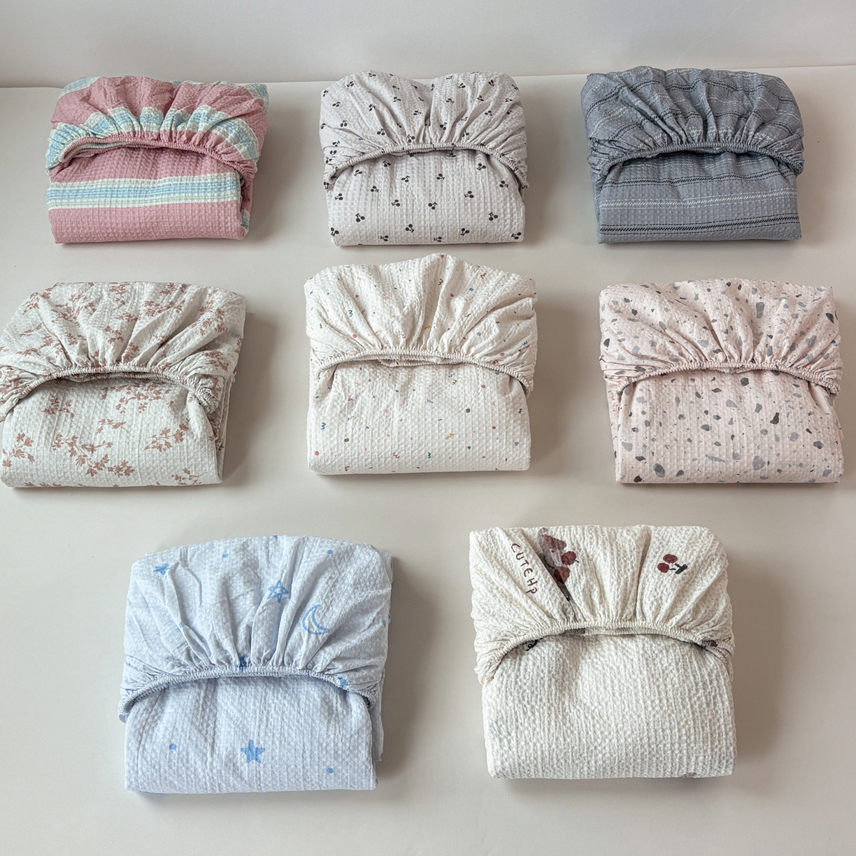 91家纺网 家纺一手货源 找家纺 居眠 2026新款全棉印花华夫格床笠 组合叠拍图