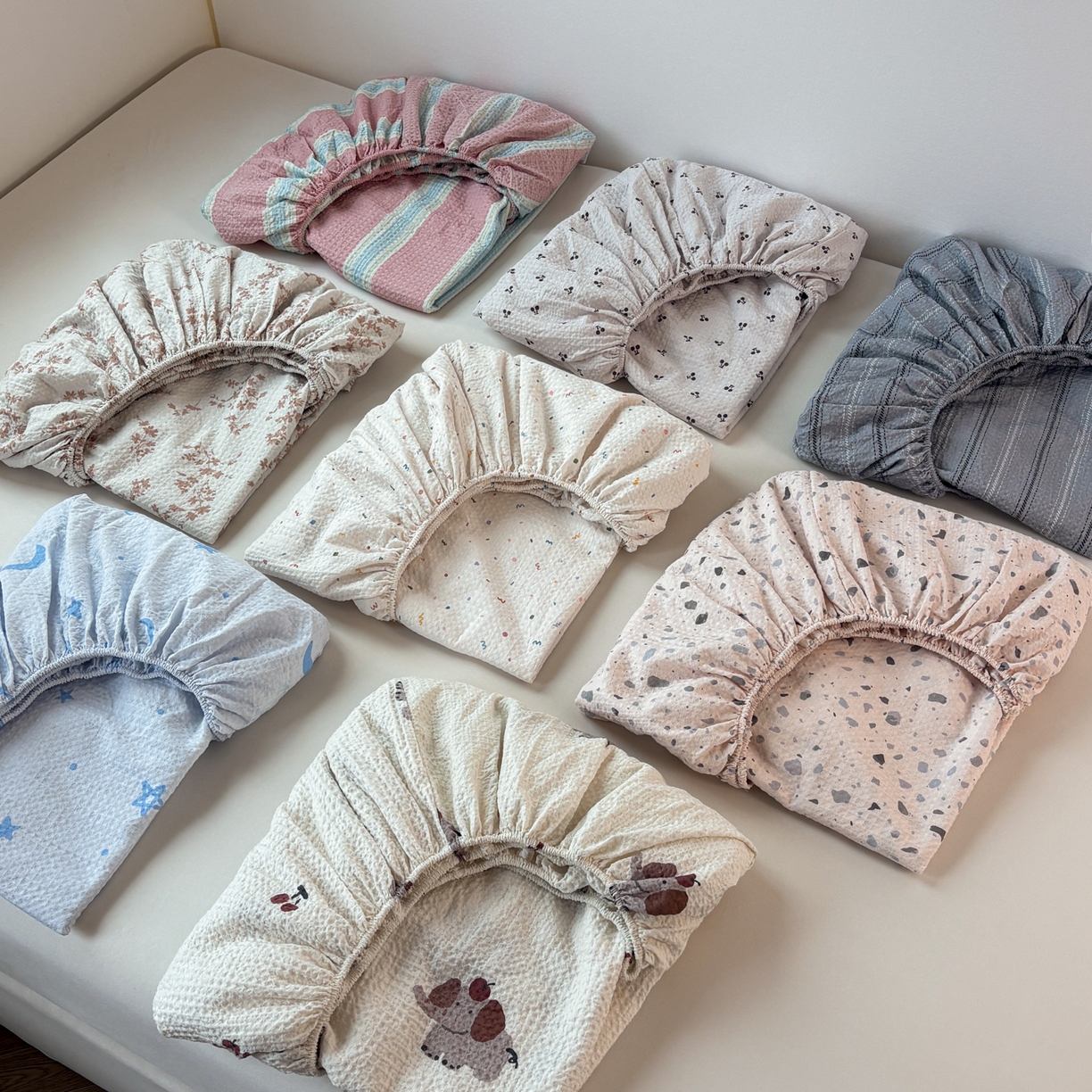 91家纺网 家纺一手货源 找家纺 居眠 2026新款全棉印花华夫格床笠 组合叠拍图