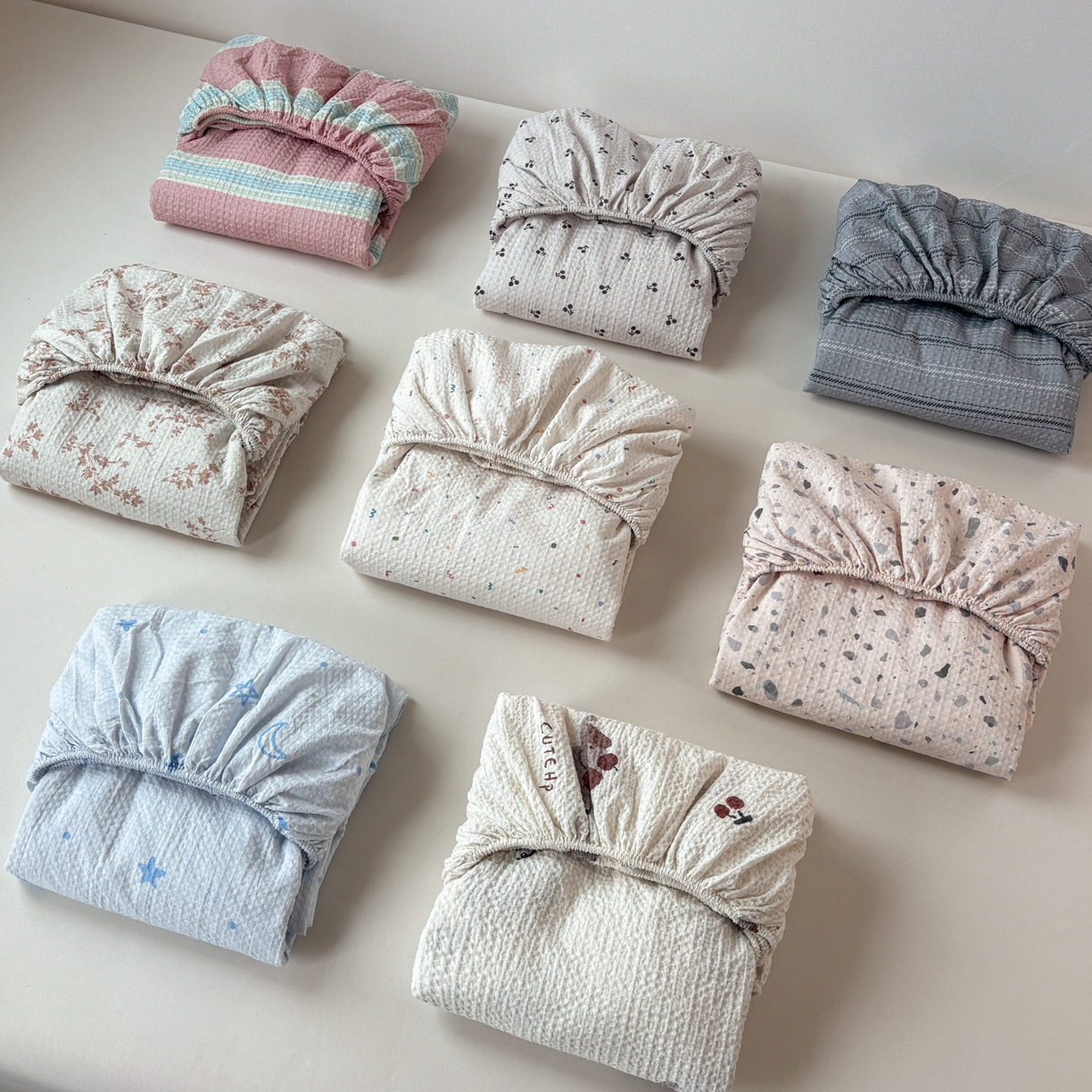 91家纺网 家纺一手货源 找家纺 居眠 2026新款全棉印花华夫格床笠 组合叠拍图