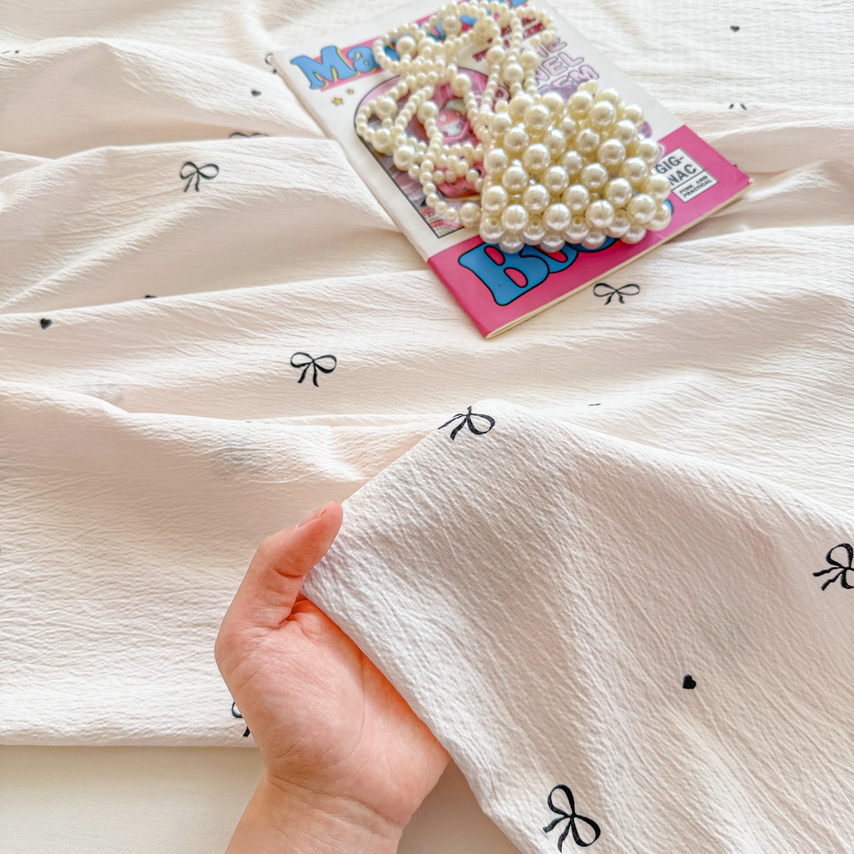 91家纺网 家纺一手货源 找家纺 丽美人家纺 2026新款A类皱皱双层纱印花单床单床单单件 粉蝴蝶结