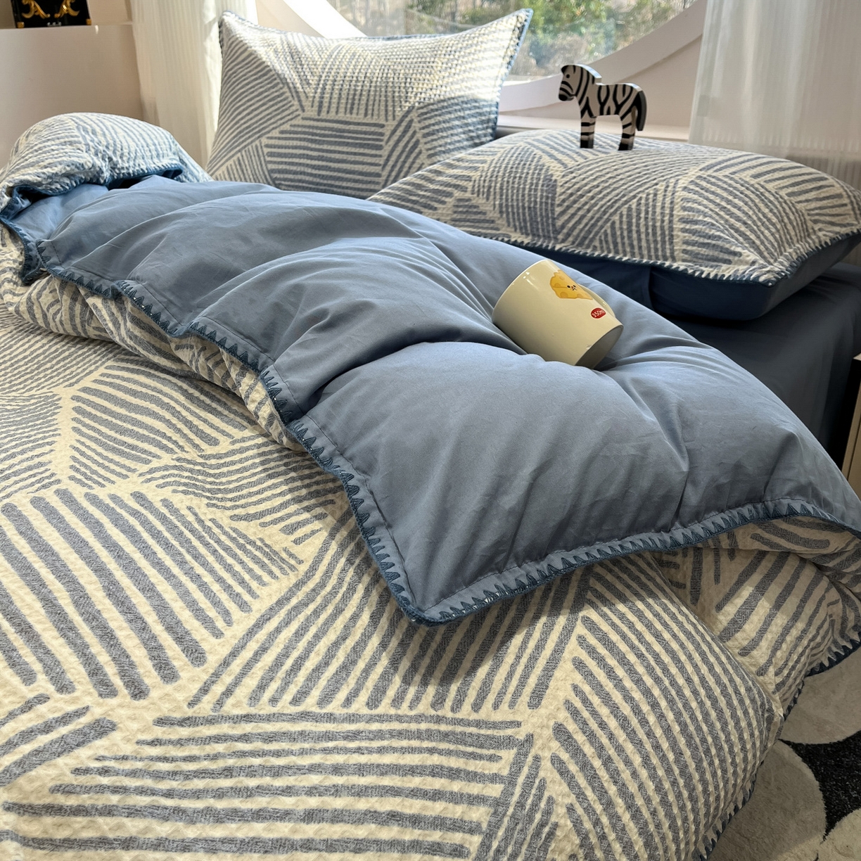 91家纺网 家纺一手货源 找家纺 如一 2026新款全棉华夫格三角针工艺四件套 流光-蓝