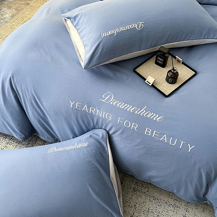 91家纺网 家纺一手货源 找家纺 鑫利来家纺 2026新款古法仿棉水洗云朵棉刺绣单枕套纯色双拼水洗磨毛简约字母刺绣枕套 慕斯-宾利兰+山灰