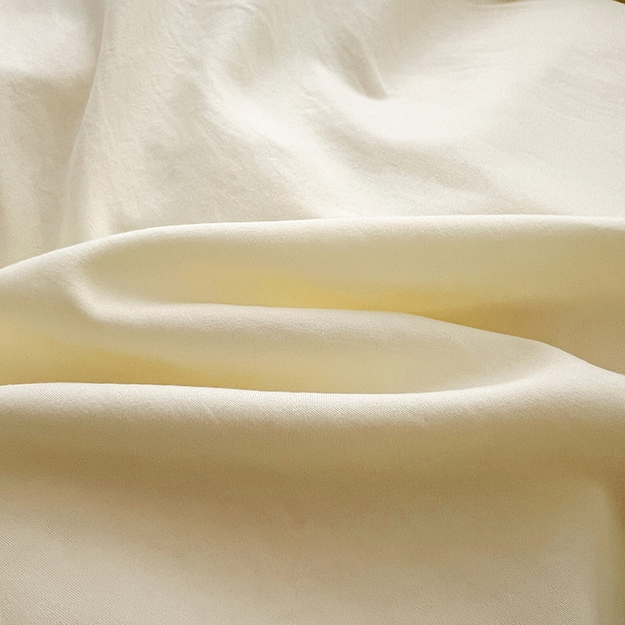 91家纺网 家纺一手货源 找家纺 鑫利来家纺 2026新款古法仿棉水洗云朵棉刺绣单枕套纯色双拼水洗磨毛简约字母刺绣枕套 慕斯-奶白+中灰