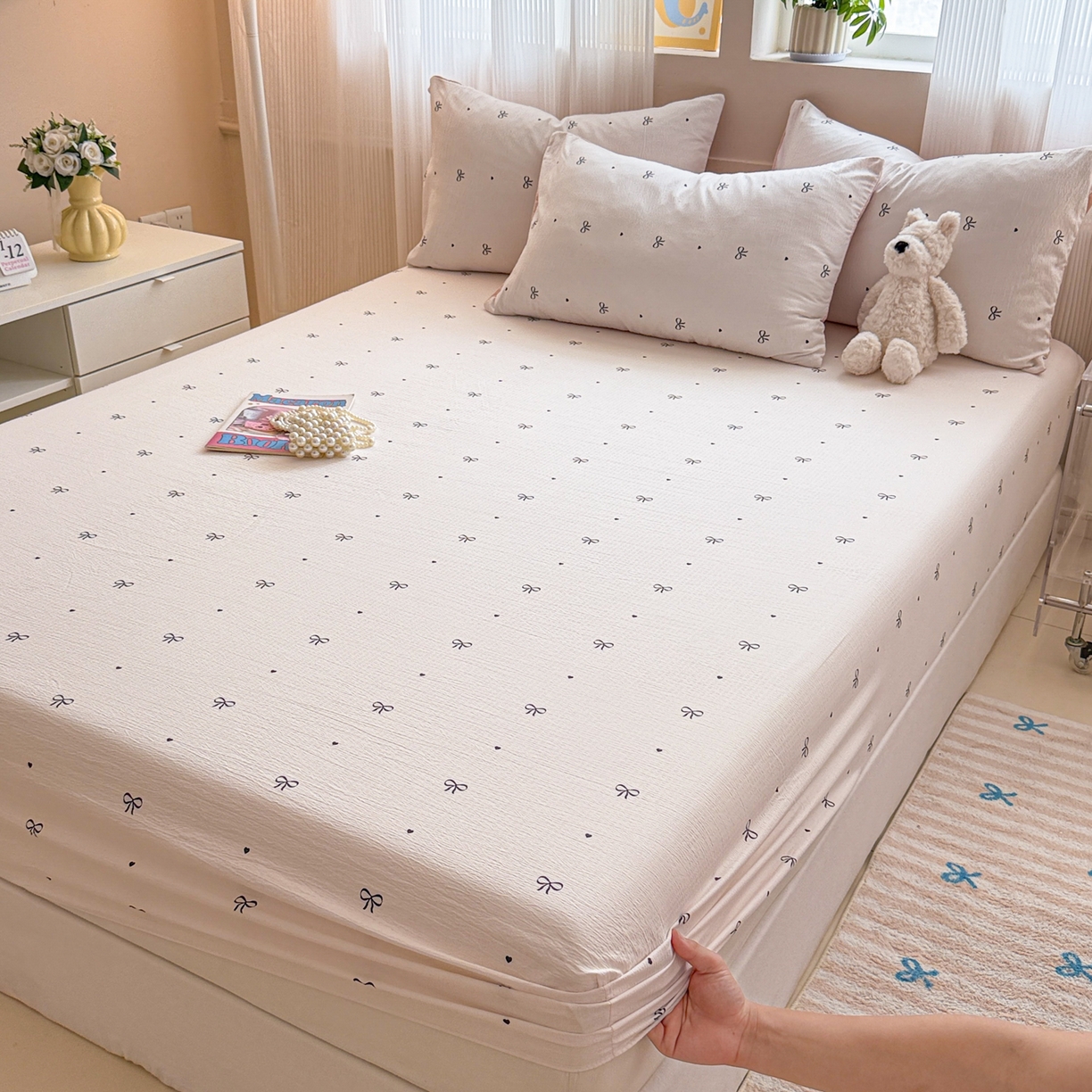 91家纺网 家纺一手货源 找家纺 丽美人家纺 2026新款A类柔软双层皱皱纱印花单床笠床笠单件 粉蝴蝶结