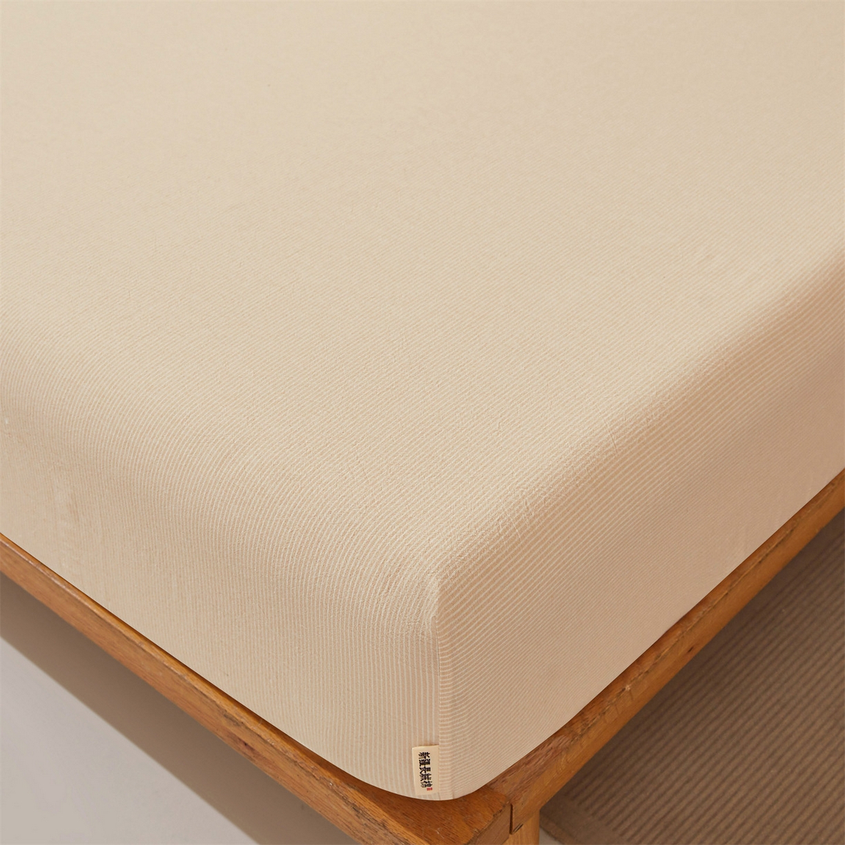 91家纺网 家纺一手货源 找家纺 女子家纺 2026新款全棉色织水洗纯色条格纯棉单层床笠床垫保护套 拾忆-条纹卡其