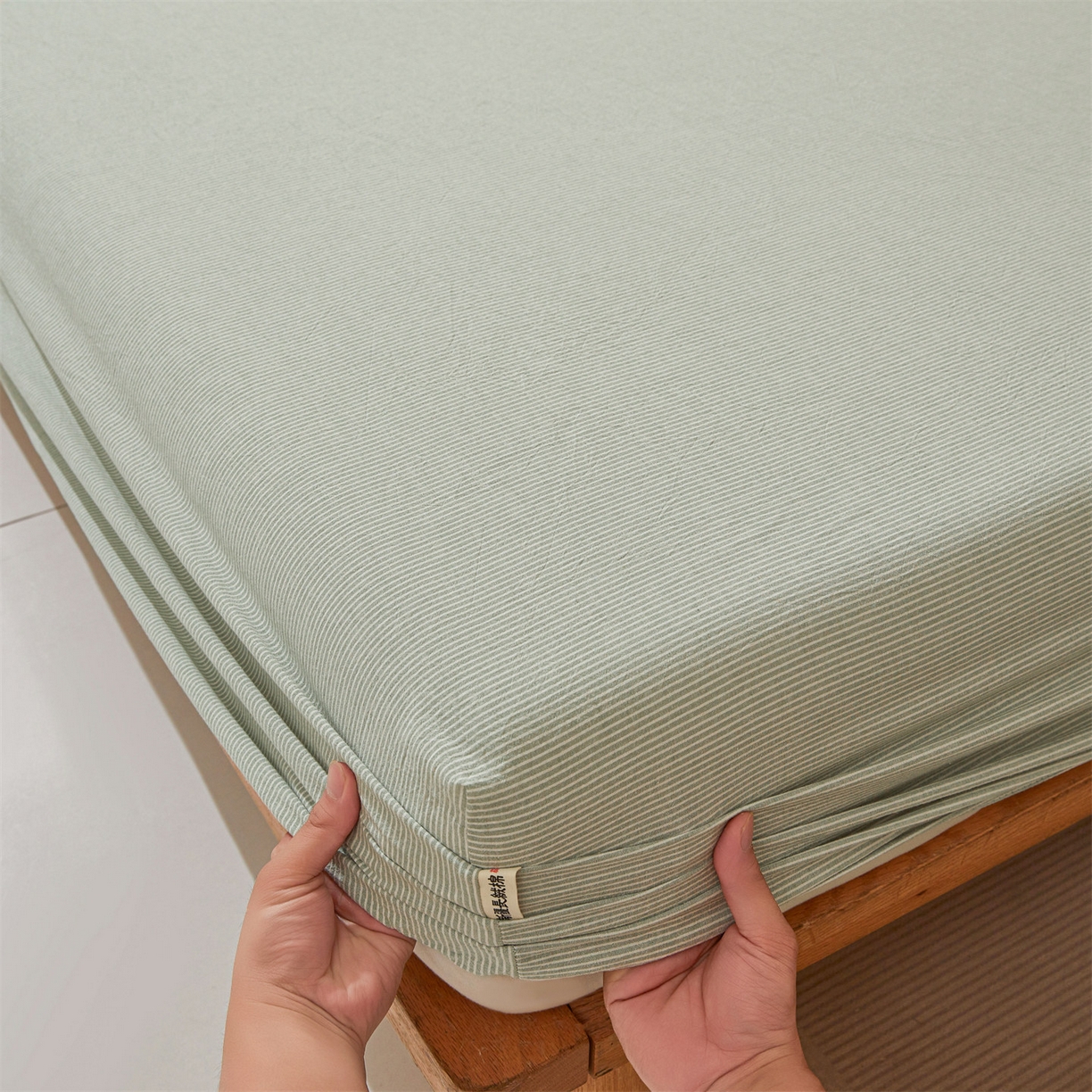 91家纺网 家纺一手货源 找家纺 女子家纺 2026新款全棉色织水洗纯色条格纯棉单层床笠床垫保护套 拾忆-条纹绿