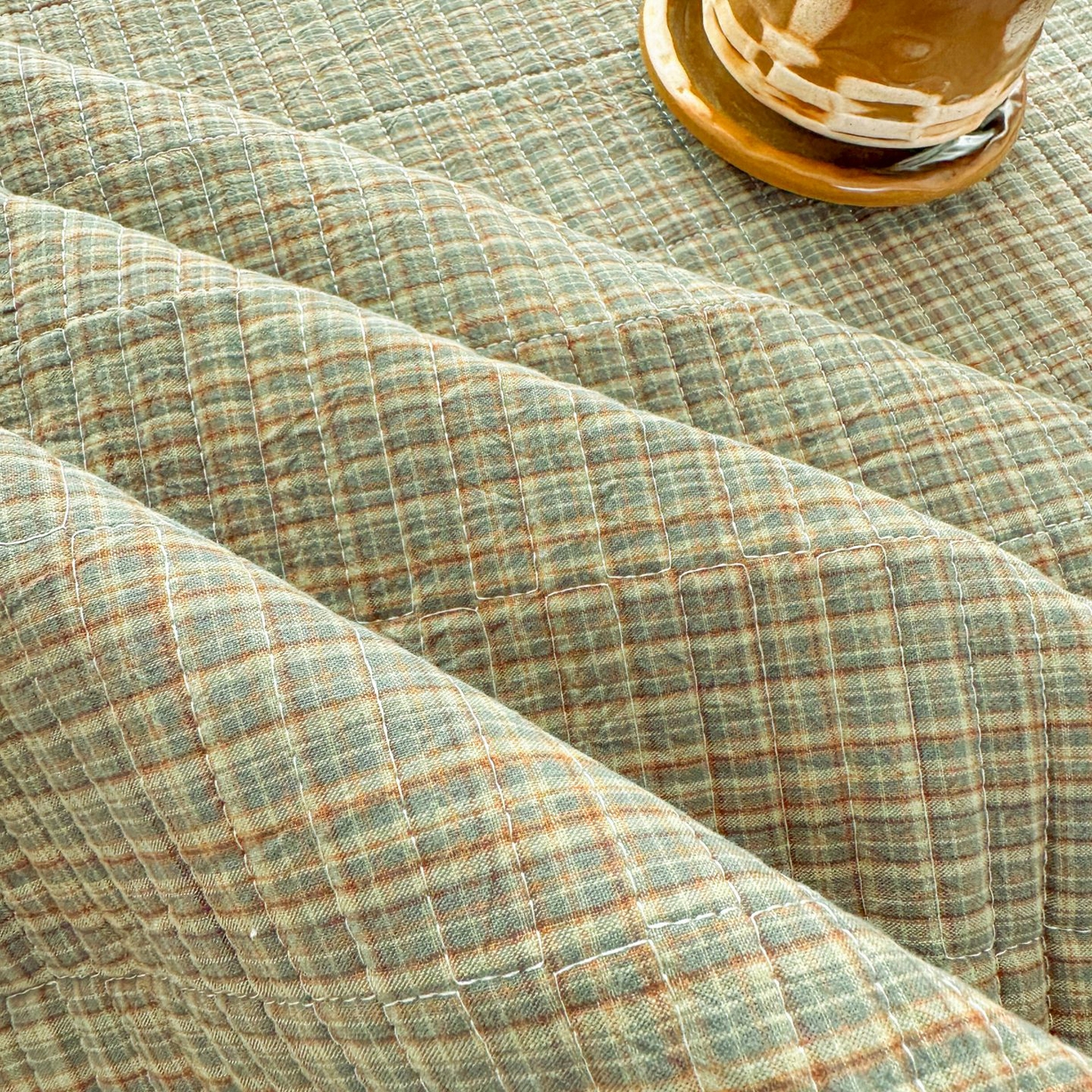 91家纺网 家纺一手货源 找家纺 暖居 2026新款大尺寸全棉色织花边款榻榻米农村大炕盖 格语绿