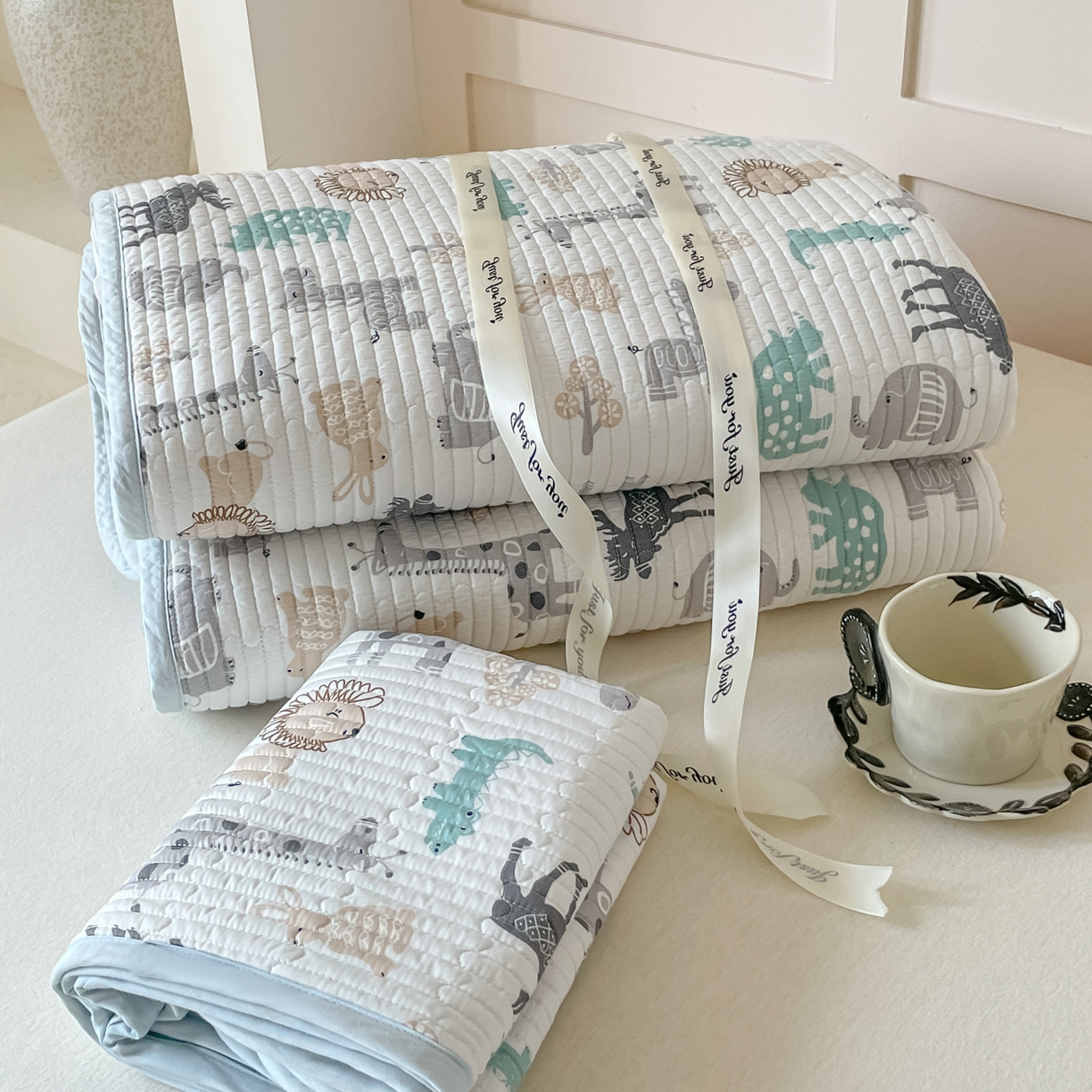 91家纺网 家纺一手货源 找家纺 漫时光 2026新款纯棉小清新棉花夹层床盖 动物世界