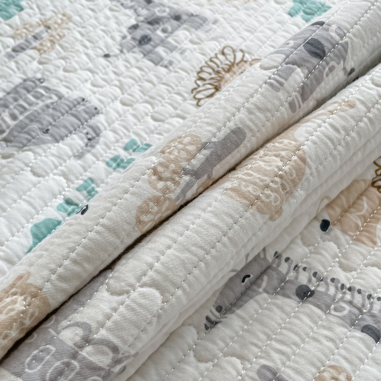 91家纺网 家纺一手货源 找家纺 漫时光 2026新款纯棉小清新棉花夹层床盖 动物世界