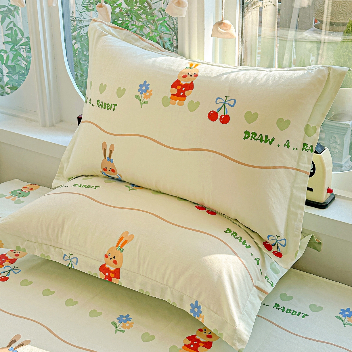 91家纺网 家纺一手货源 找家纺 恩泽家纺 2026春夏新款全棉纯棉12868印花四件套及单品系列-单枕套枕套单件 樱桃兔