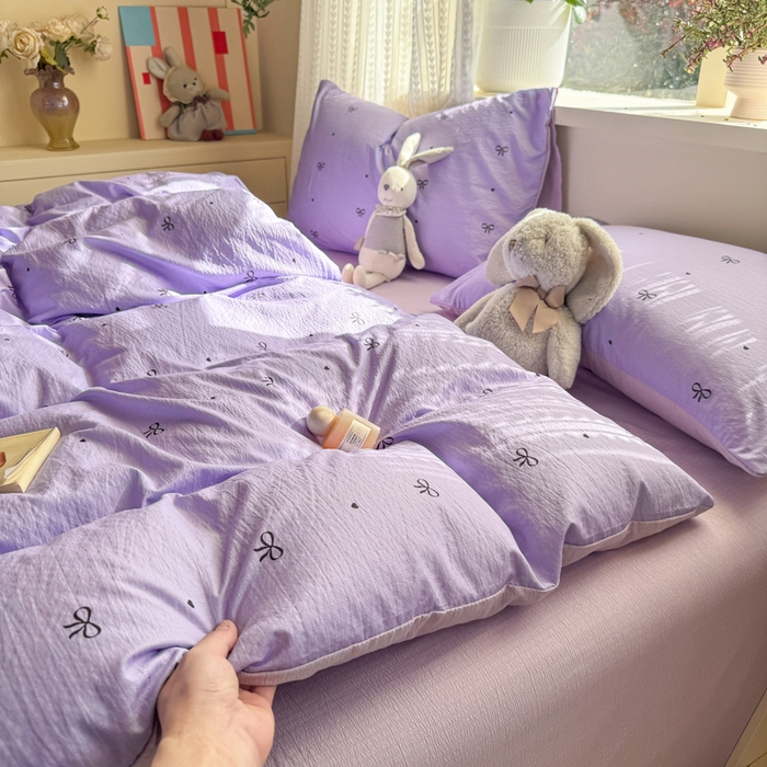 91家纺网 家纺一手货源 找家纺 丽美人家纺 2026新款A类皱皱纱双层印花四件套 紫色蝴蝶结