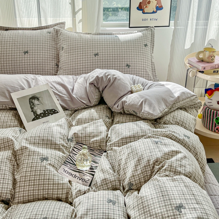 91家纺网 家纺一手货源 找家纺 尚美 2026新款简约印花床盖四件套 格子蝴蝶结